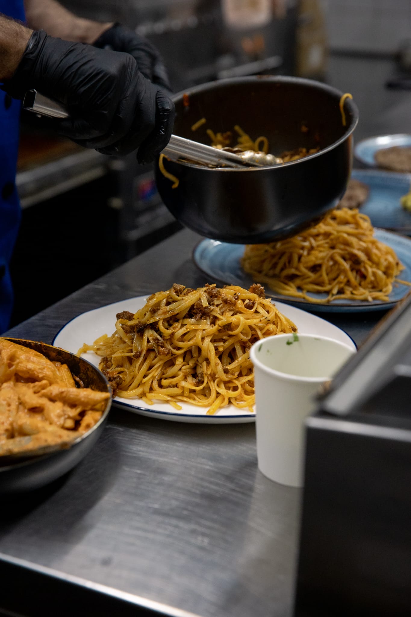 Fresh pasta being served in the kitchen